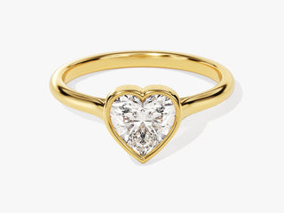 1.00 carat Heart-cut Moissanite engagement ring with a secure, full bezel setting.