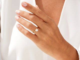 Classic Princess Moissanite solitaire ring, 1CT equivalent, four-prong setting.