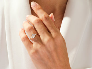 Emerald Moissanite Diamond Cluster Engagement Ring with sparkling emerald-cut center stone and surrounding Moissanite accents