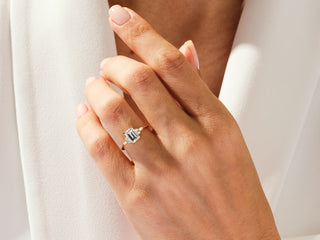 Emerald Moissanite Diamond Cluster Engagement Ring with round and pear-shaped accents for modern bridal elegance.