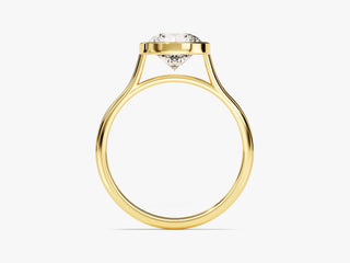 Ethically sourced 1.50CT round moissanite bezel engagement ring in yellow gold