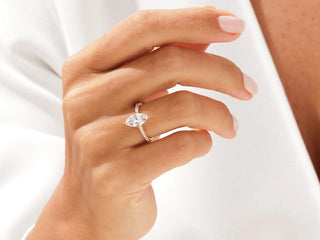 Marquise-cut Moissanite engagement ring with pave diamonds in white gold