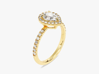Romantic pear Moissanite engagement ring featuring halo and pave diamond accents