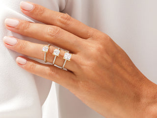 Princess moissanite engagement ring with sparkling pavé-set diamond band