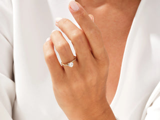 Romantic heart-shaped moissanite ring with pavé diamond twisted band