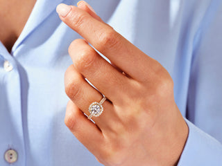 Round-cut Moissanite engagement ring featuring double halo and double pave band