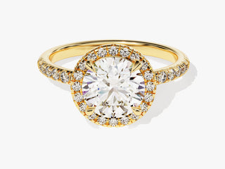 Elegant round moissanite ring surrounded by pavé-set halo diamonds