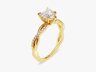 Twisted pavé engagement ring with heart-cut moissanite center stone