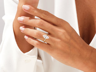 Unique Marquise Cut Moissanite Ring with Twisted Diamond Band