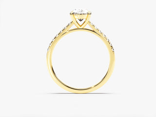Luxury engagement ring featuring an oval-cut moissanite and elegant cathedral pavé band