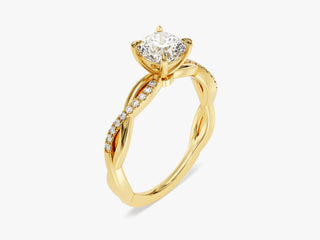 “Elegant twisted band engagement ring with cushion moissanite center stone and pavé diamonds